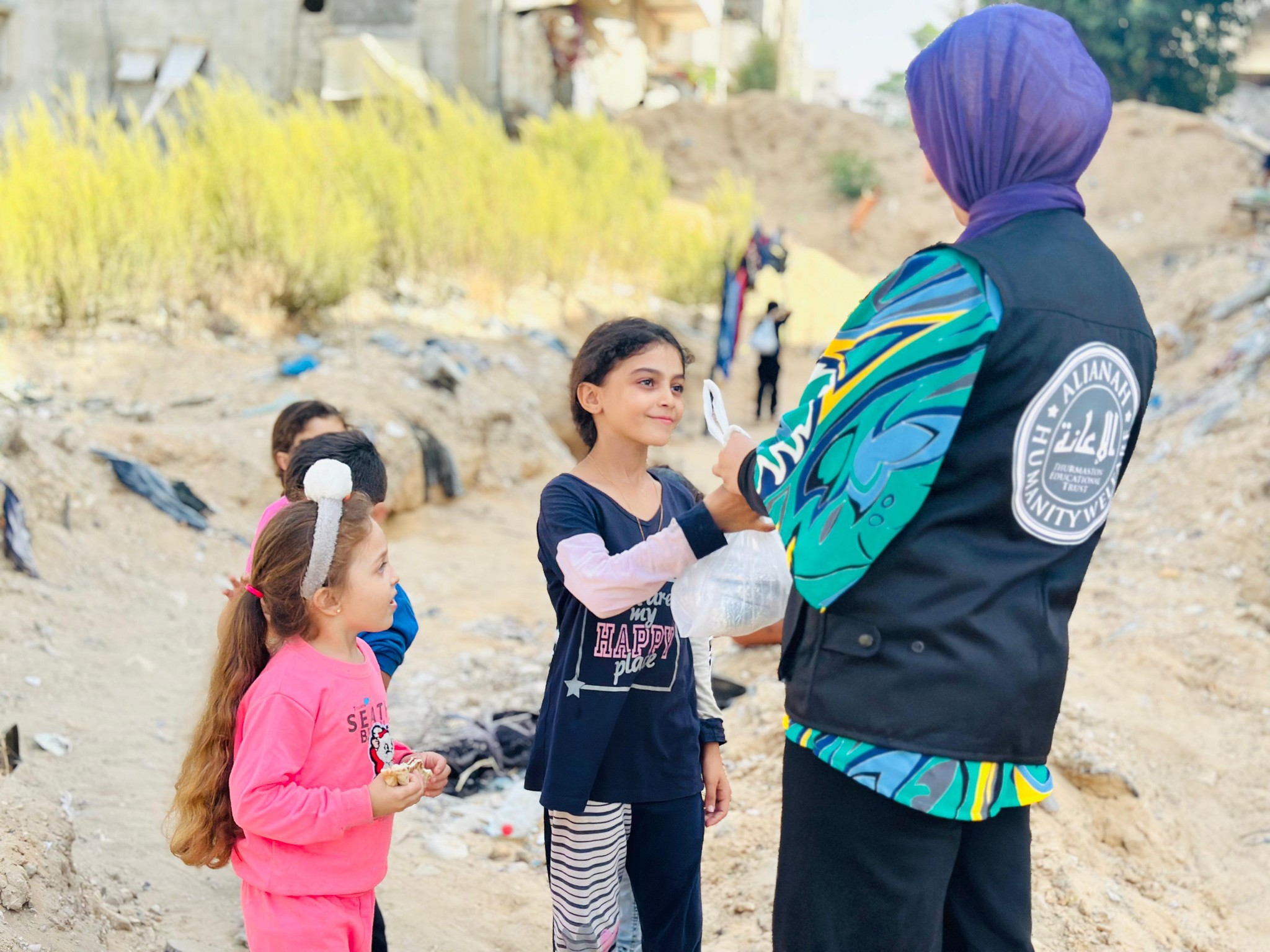 woman in blue hijab sitting on chair