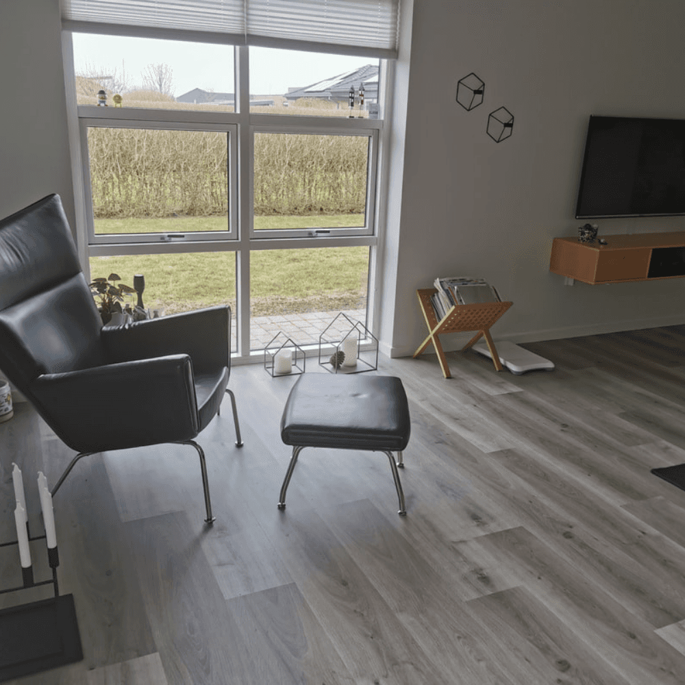 man in blue shirt standing in front of man in blue shirt