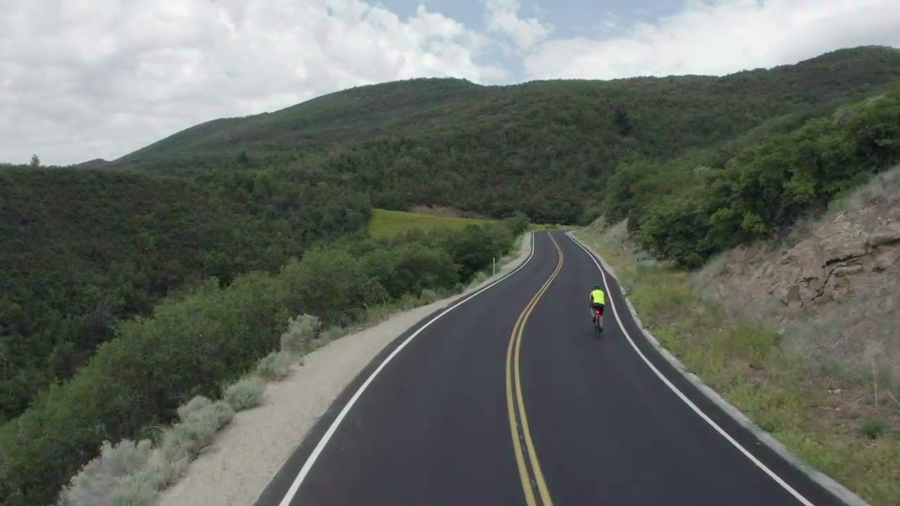 Race days in Heber Valley: runners above Jordanelle, cyclists in the mountains behind Soldier Hollow, paddlers at the mass start