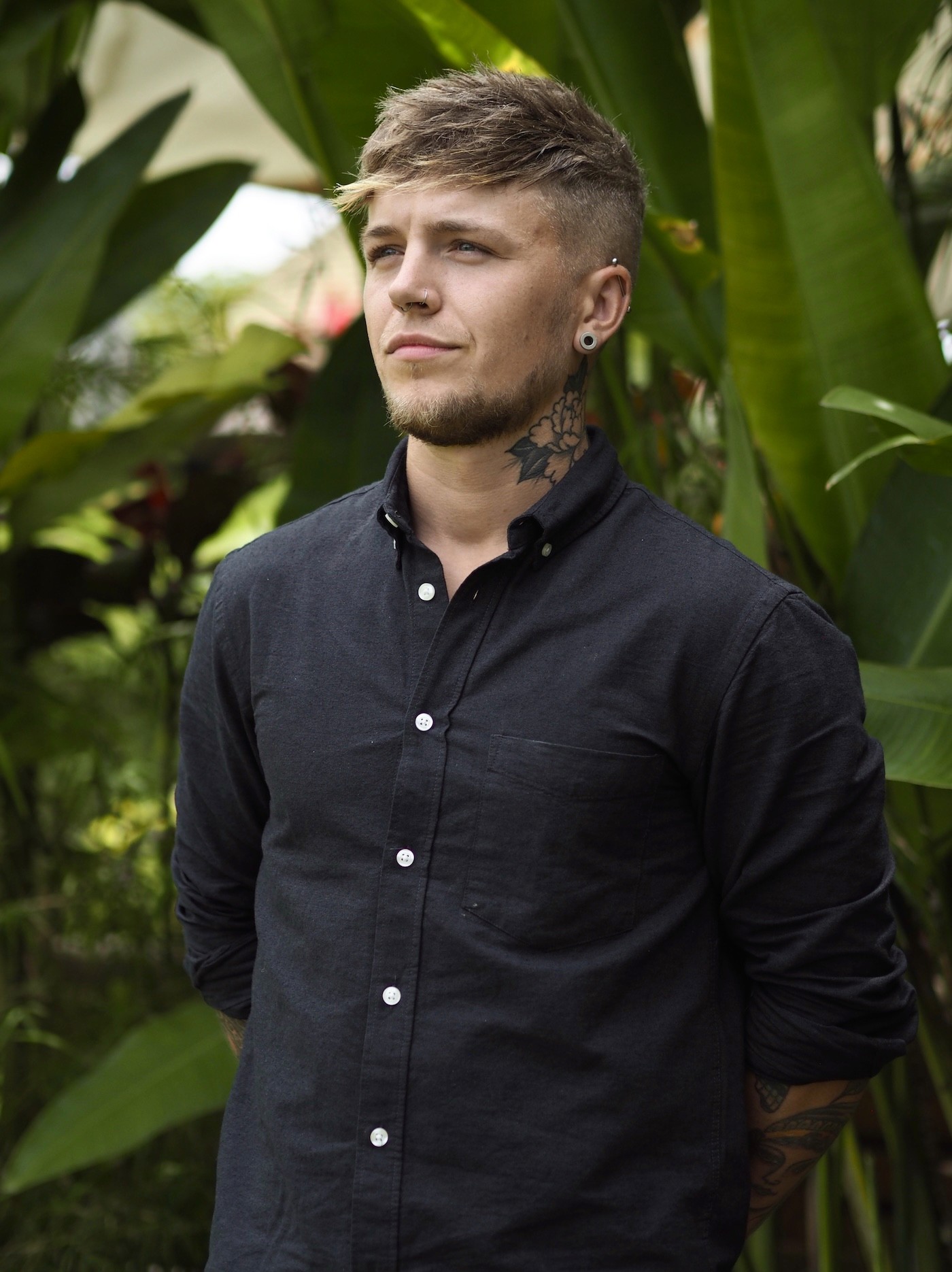 A curved facade covered in white latticework