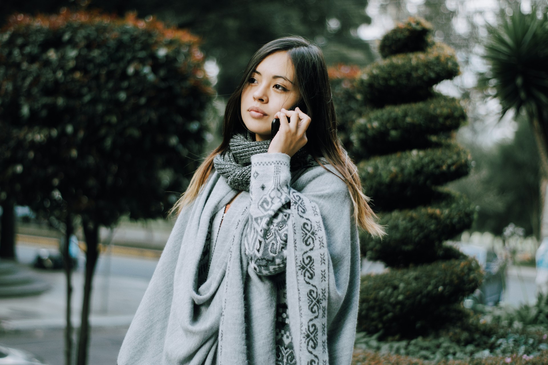 A woman talking on a phone
