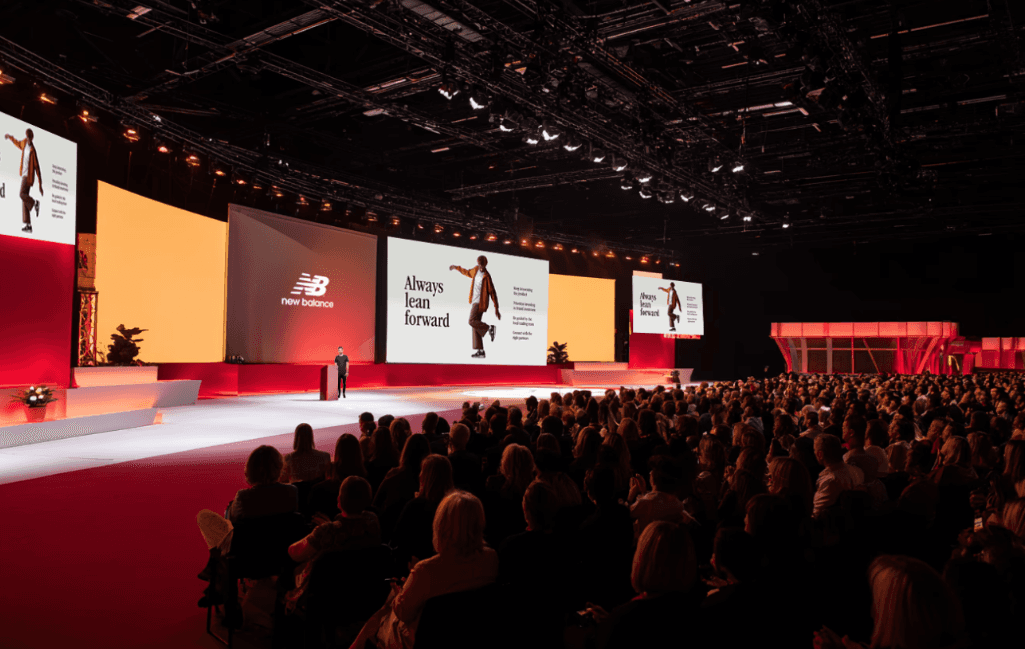 A photo of two people discussing a slide layout