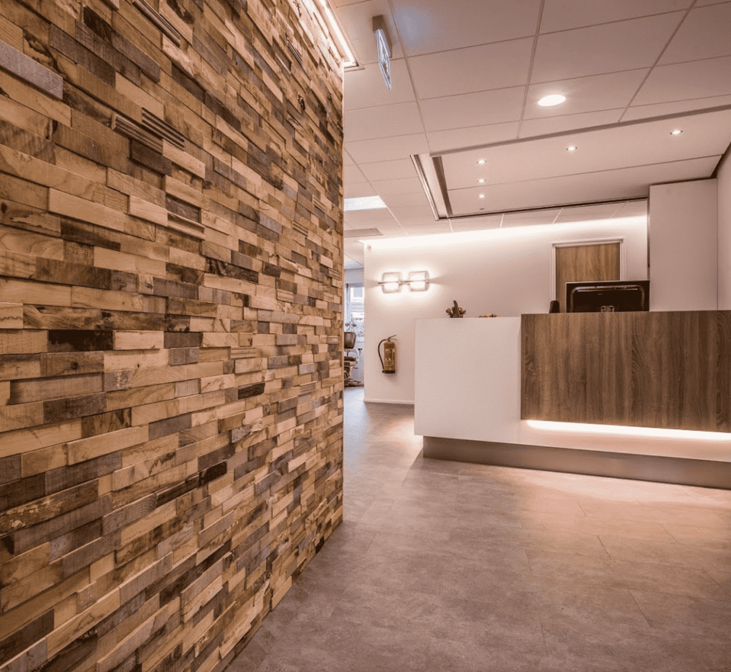 Modern kitchen interior featuring a central island, wooden cabinetry, and bright lighting. Spacious and minimalist design.