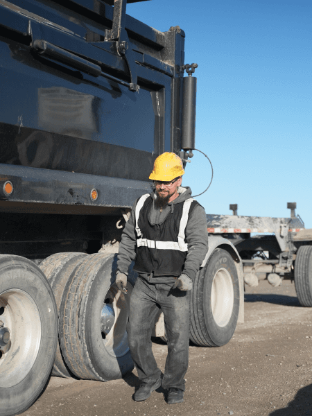 Rolas Truck Driver's hand on the truck steering wheel