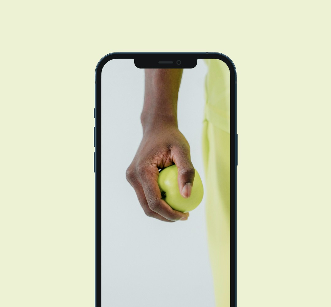 A mockup of a phone displaying an image of a man holding a tennis ball