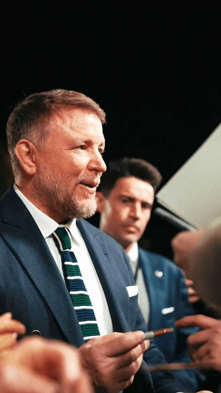 Woman in black outfit sitting on floor