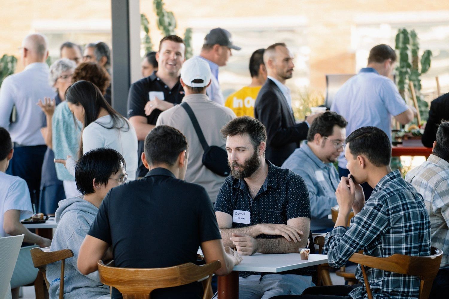 a black and white living room with a large tv