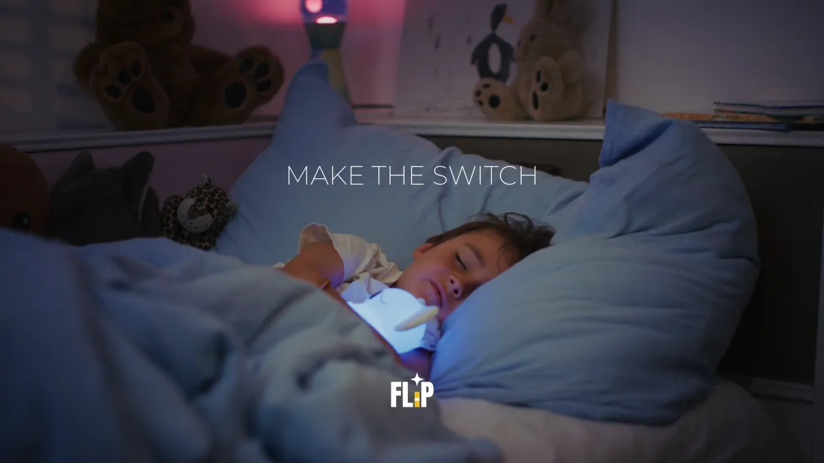 Commercial campaign still of a sleeping child with the text "MAKE THE SWITCH" and the FLIP logo.