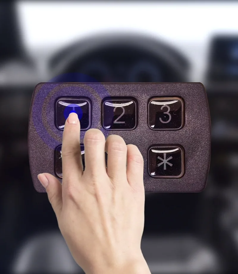 Hand entering PIN code on automotive security keypad with animated blue touch feedback