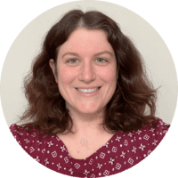 Headshot of Jen Elbert, smiling with curly brown hair. She is the Partner Engagement Coordinator.