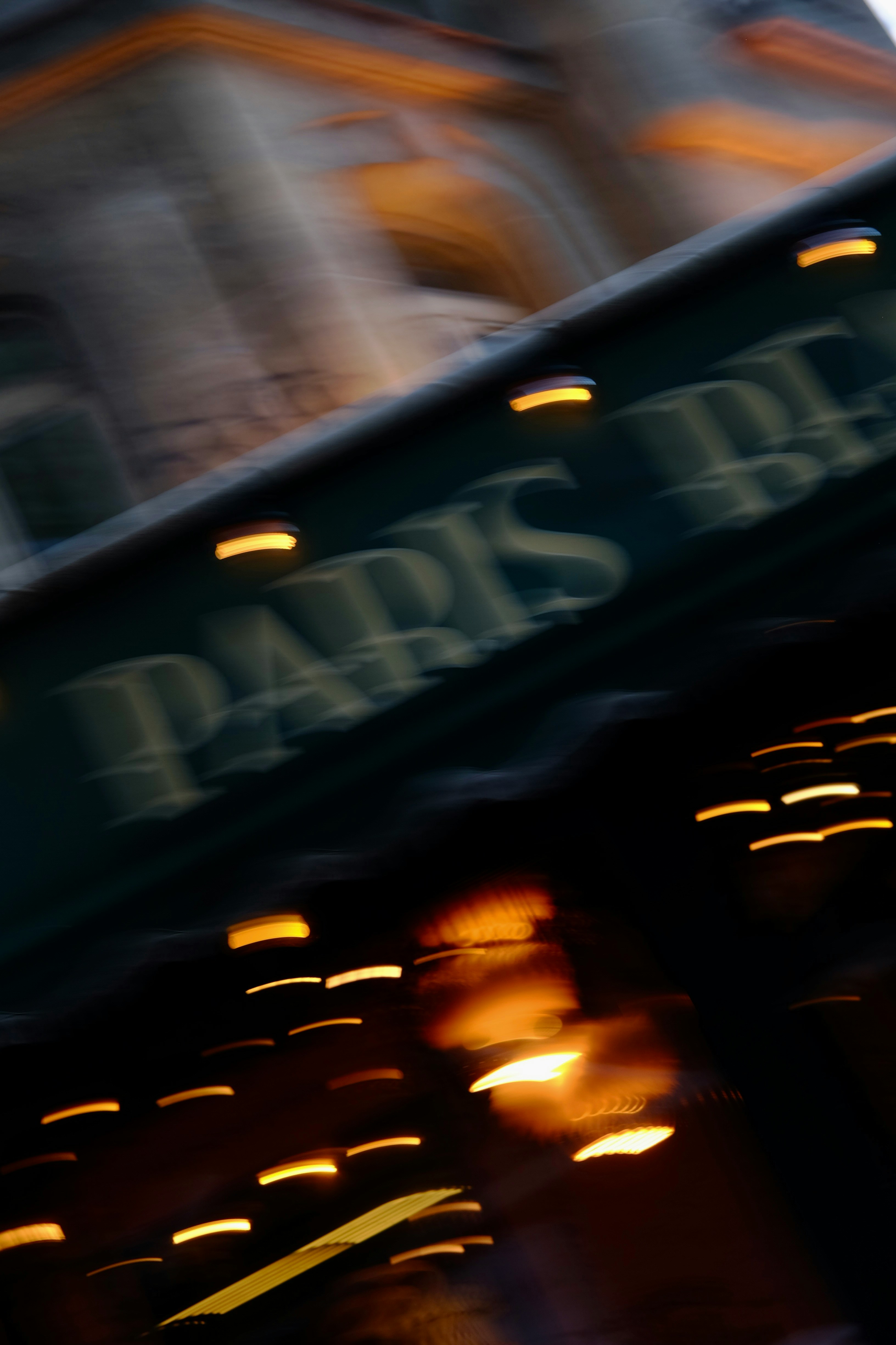 Blurry lights and building at night