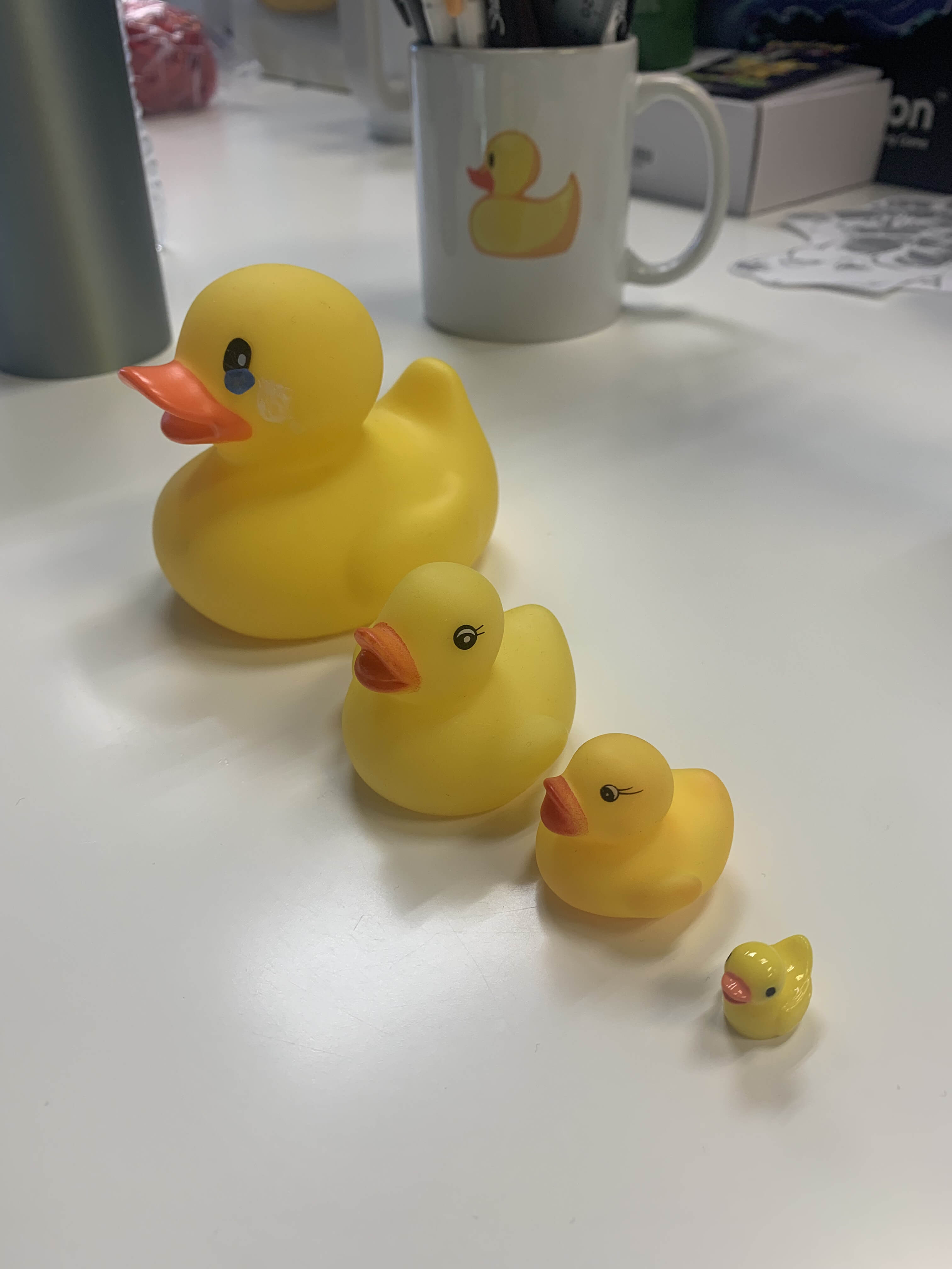 people in a large building with Tate Modern in the background