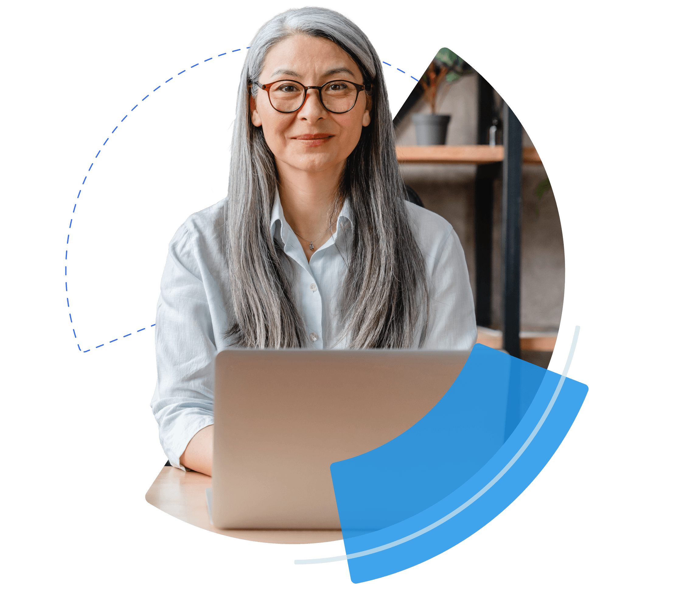 Image of a mature lady, framed with blue rings,  sitting at a desk looking at the camera.