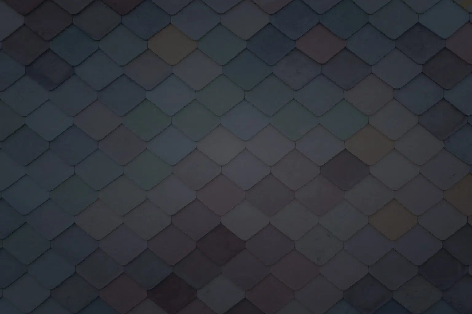 Mehrere bunte quadratische Steine, die aufeinander gestapelt sind