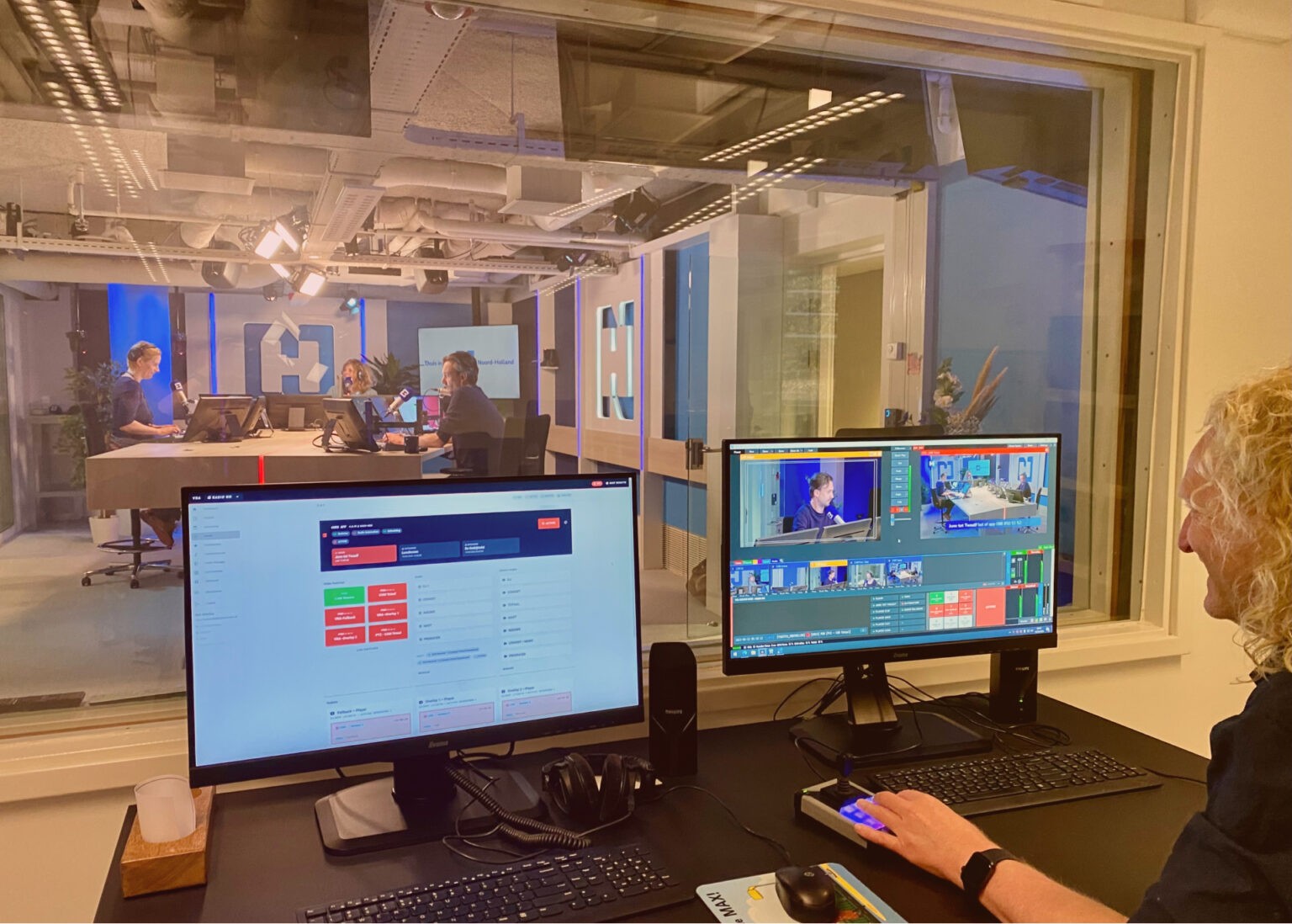 Photo of NH Radio recently built radio studio, with Visual Radio Assist’ Cloud dashboard in the foreground.