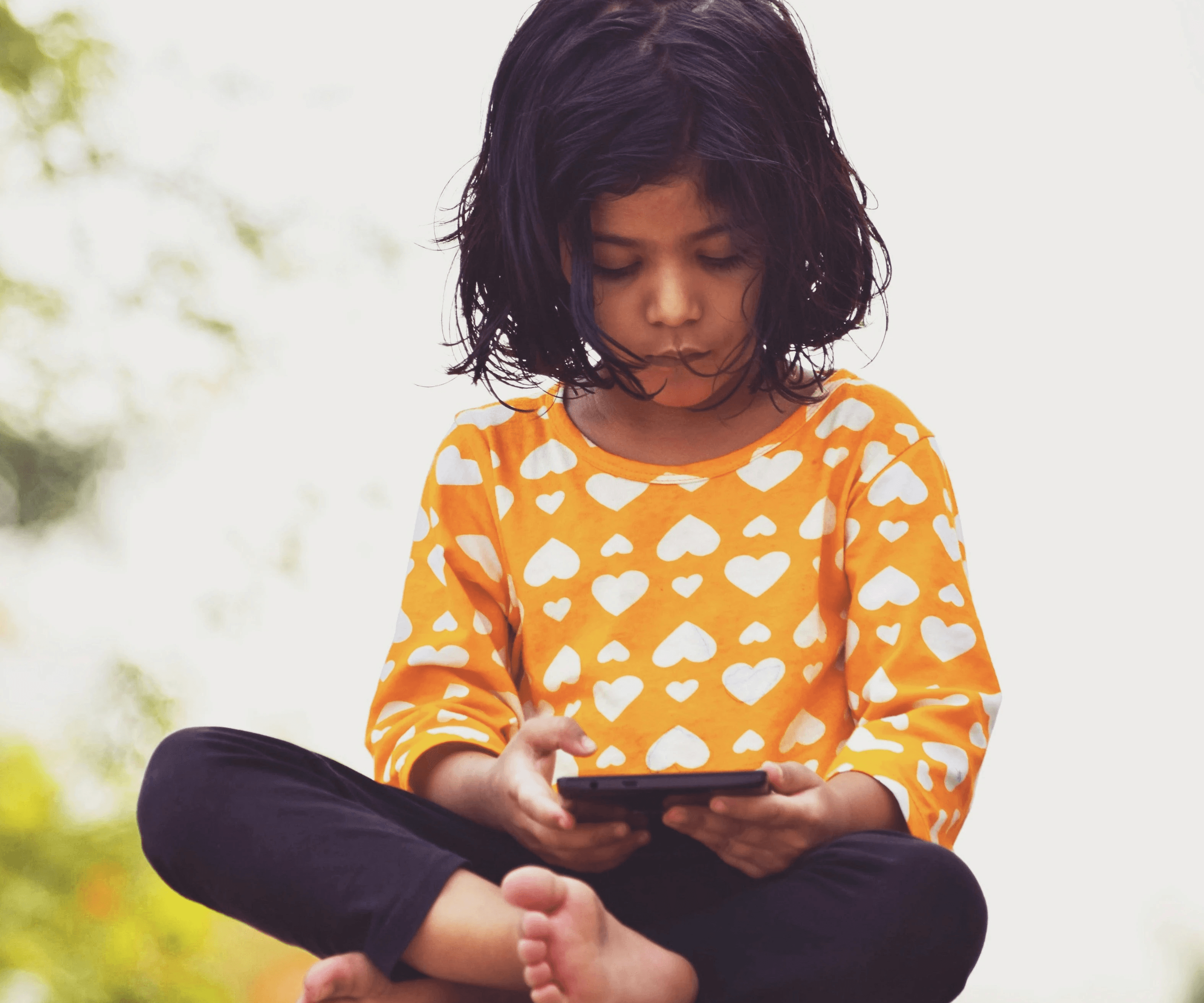 girl's orange and white top