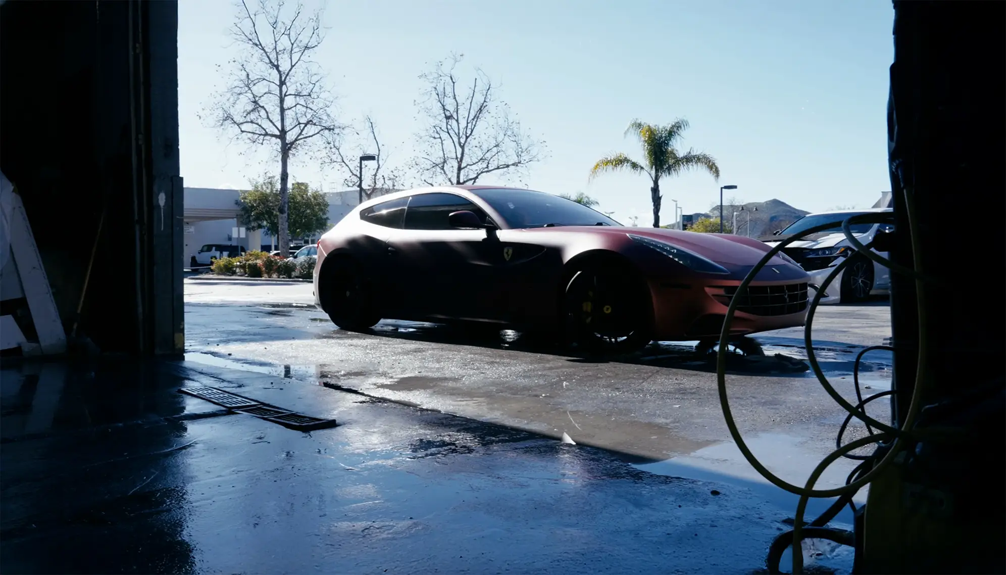Auto Body Unlimited facility in Simi Valley featuring a vehicle inside the shop during professional auto body repair.