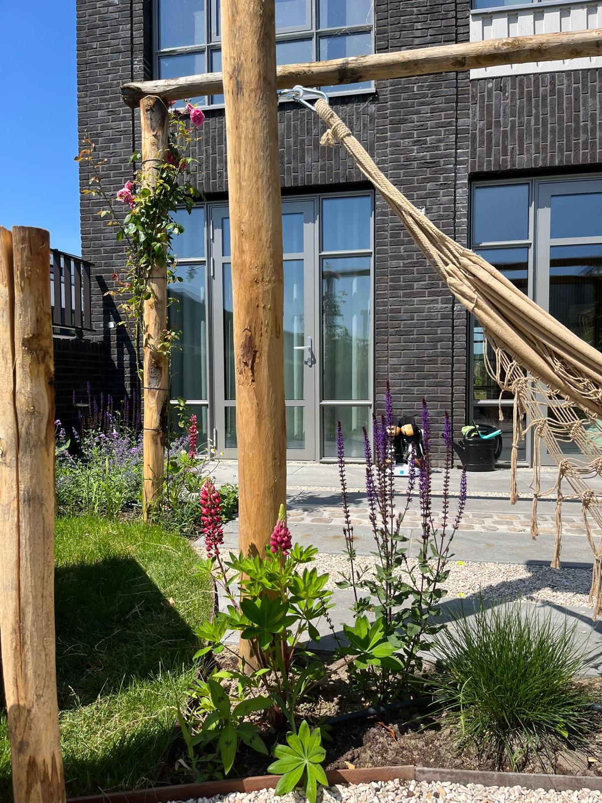 Tuin met natuurlijke materialen in Muiden - Art gardens