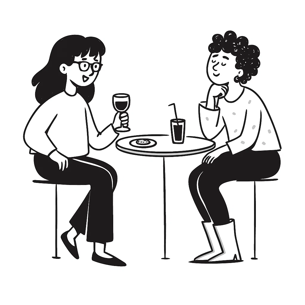 clear drinking glass with coffee on top of white table