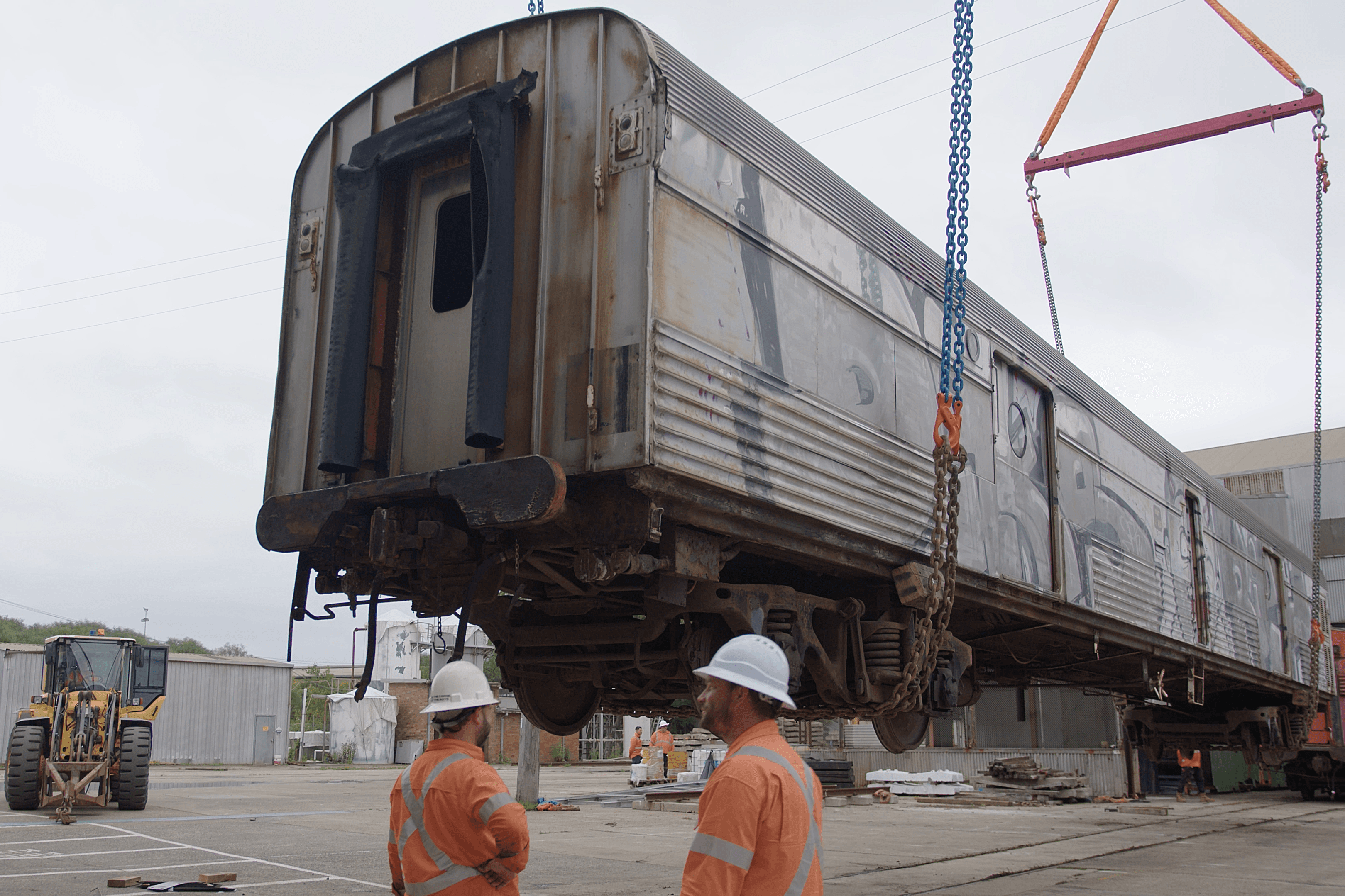 Locomotive 3203 sits on a flatbed truck.