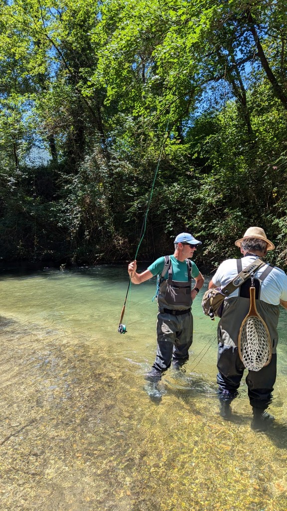 Best fishing guides in Europe casting in a pristine river