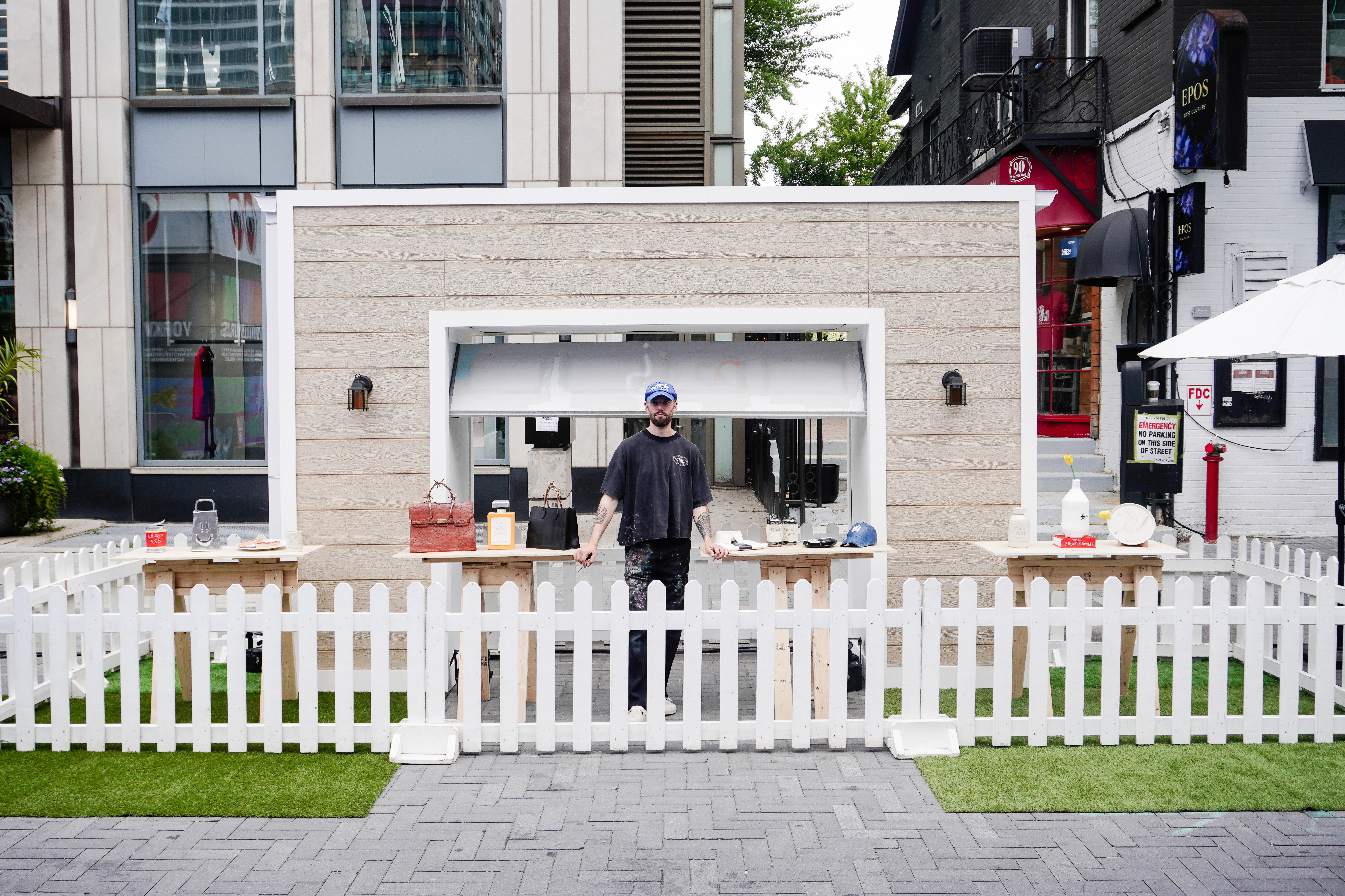 Woman wears a blue coat in a blue environment.