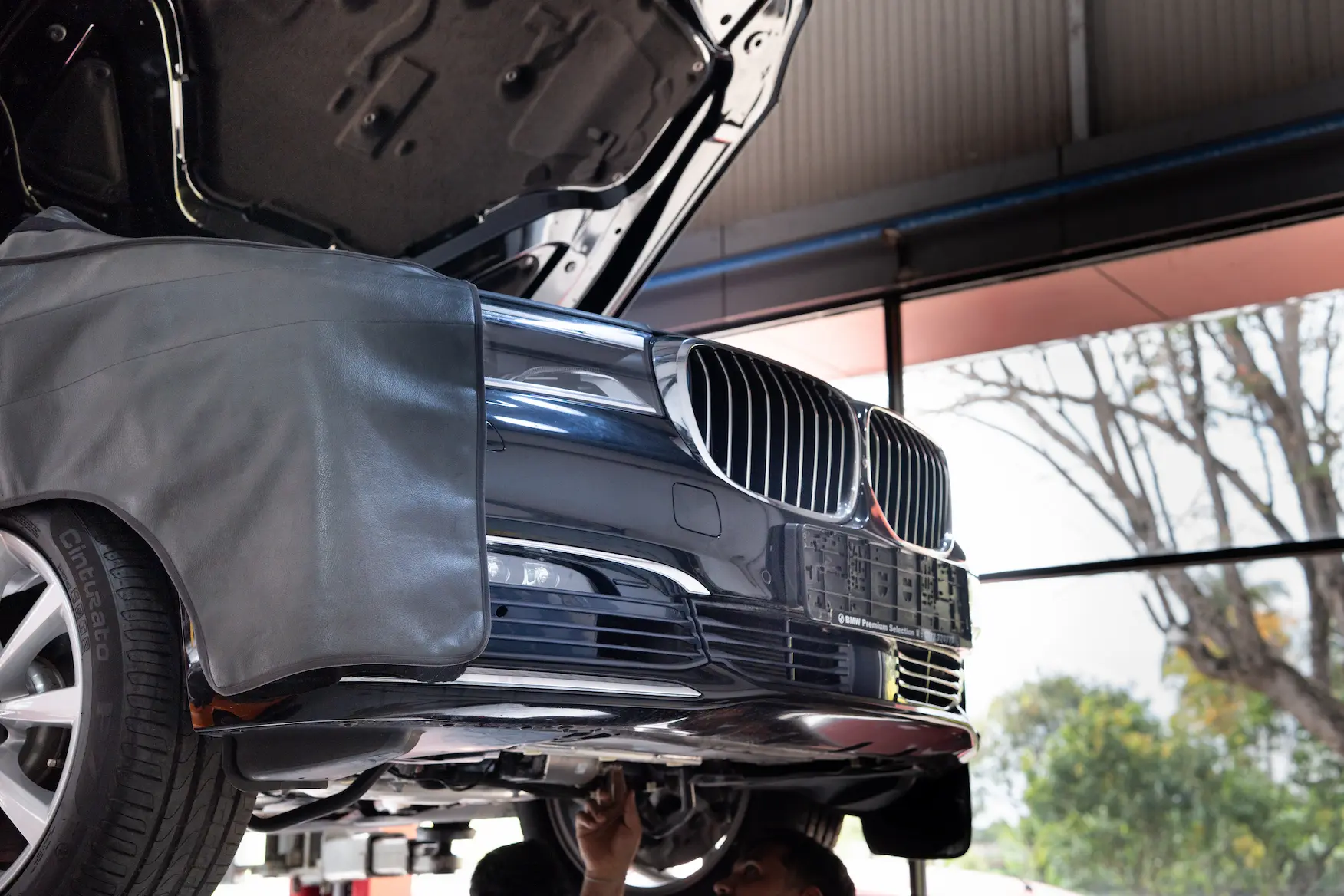 Fixing a dent of a car at Ideal Premier
