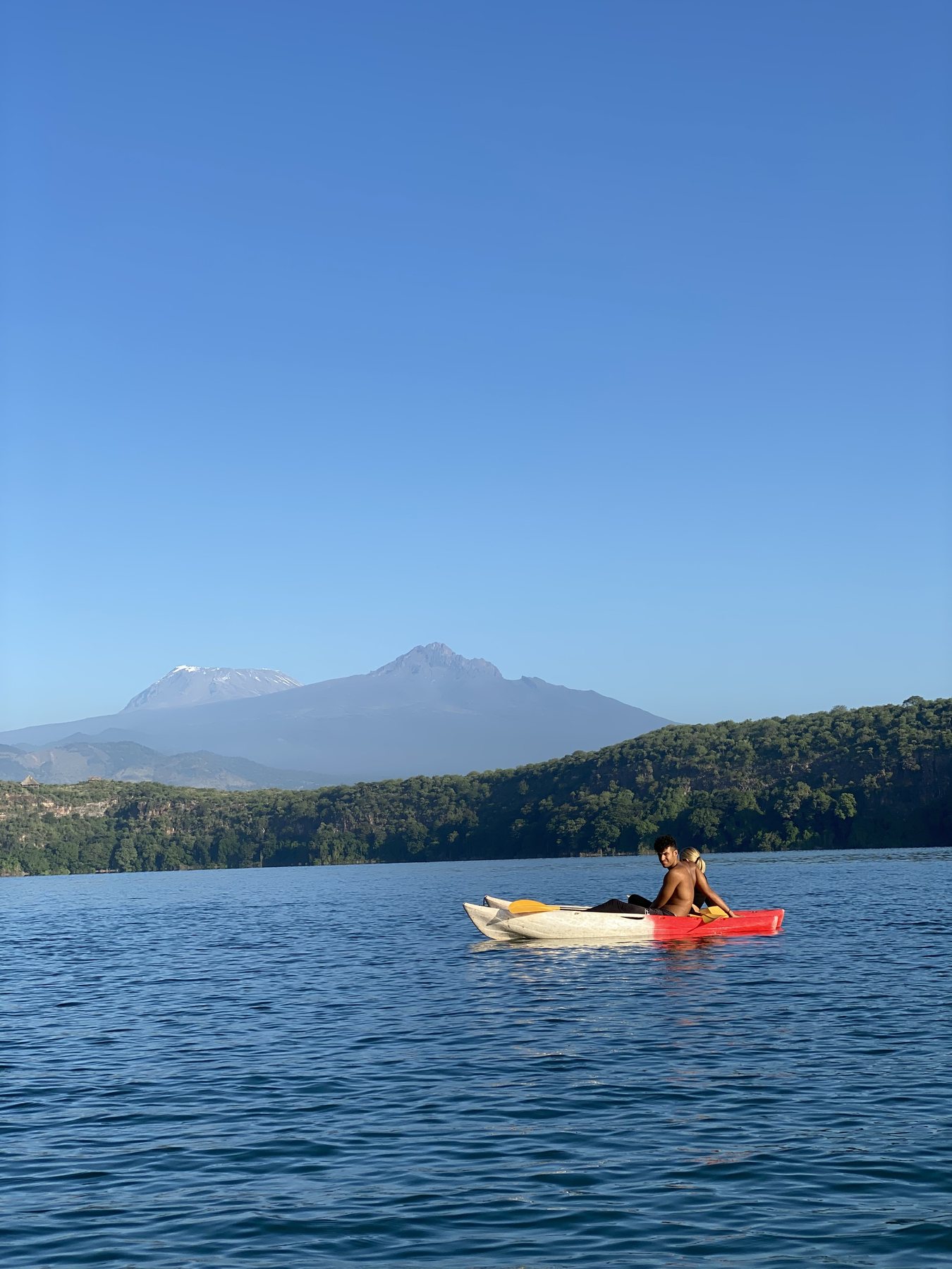 Travellers enjoying a lake adventure in Tanzania.
