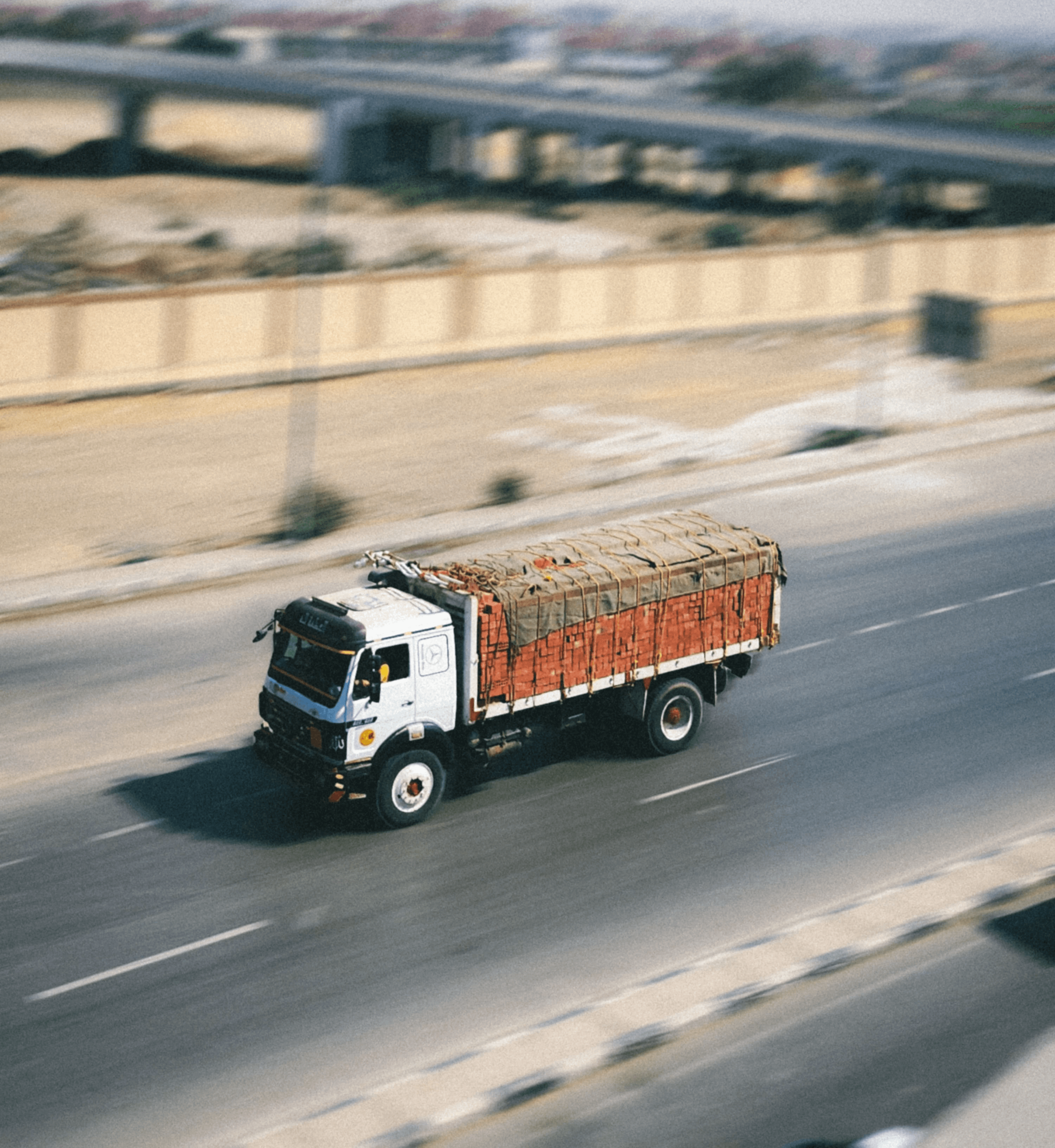 A truck going on road with high speed