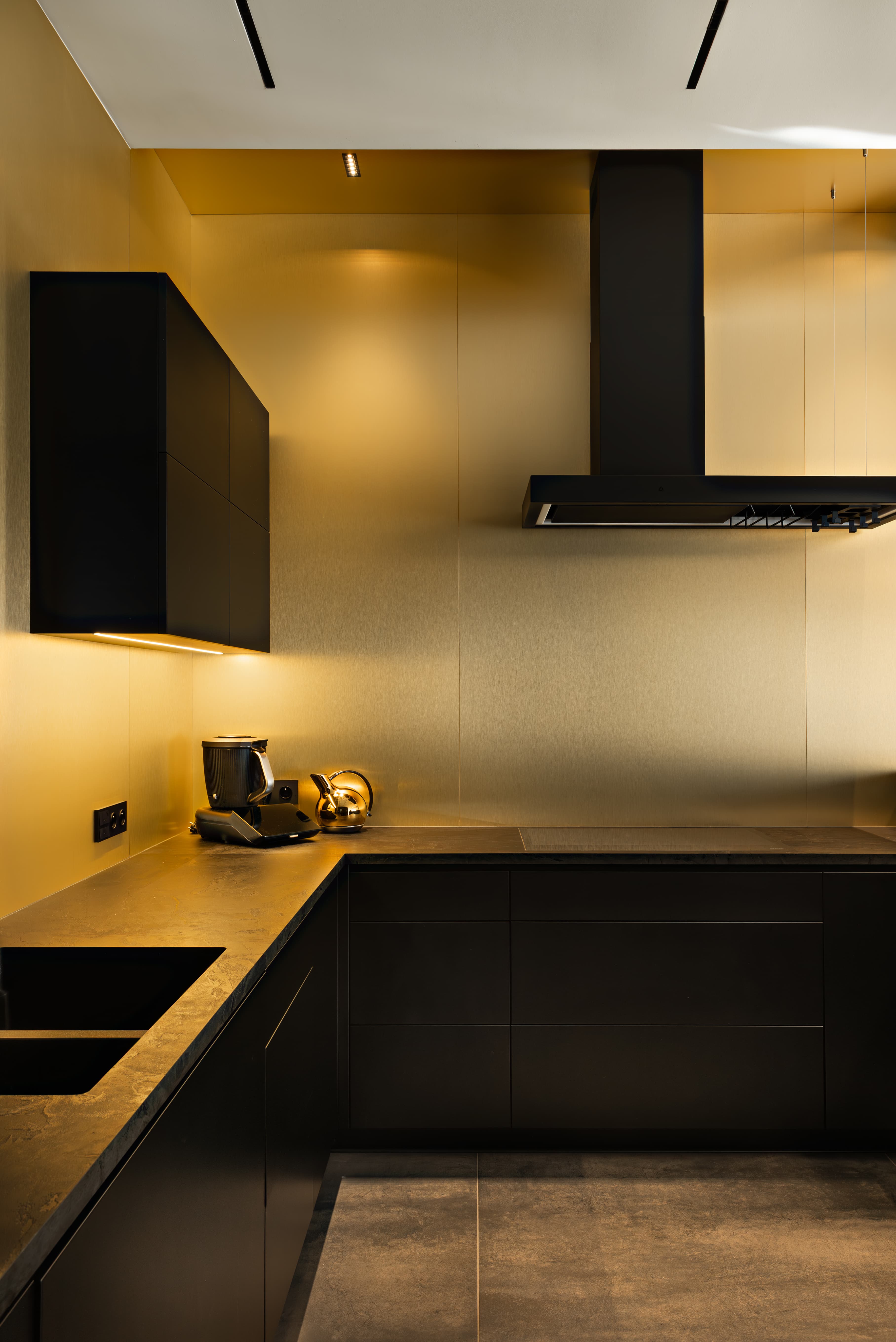 gold and black kitchen