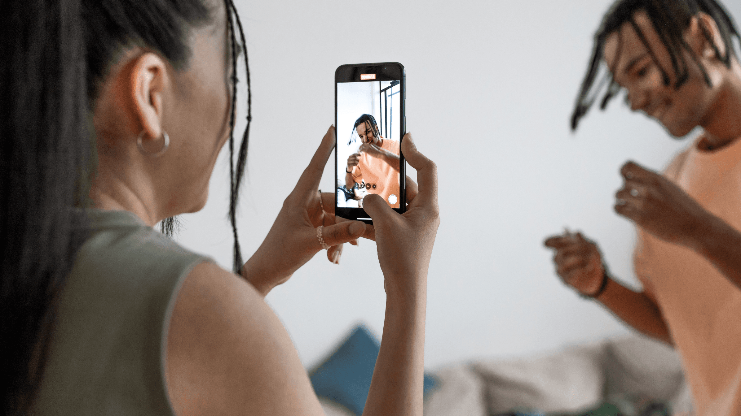 Artistic portrait with red and blue lighting creating a dramatic effect