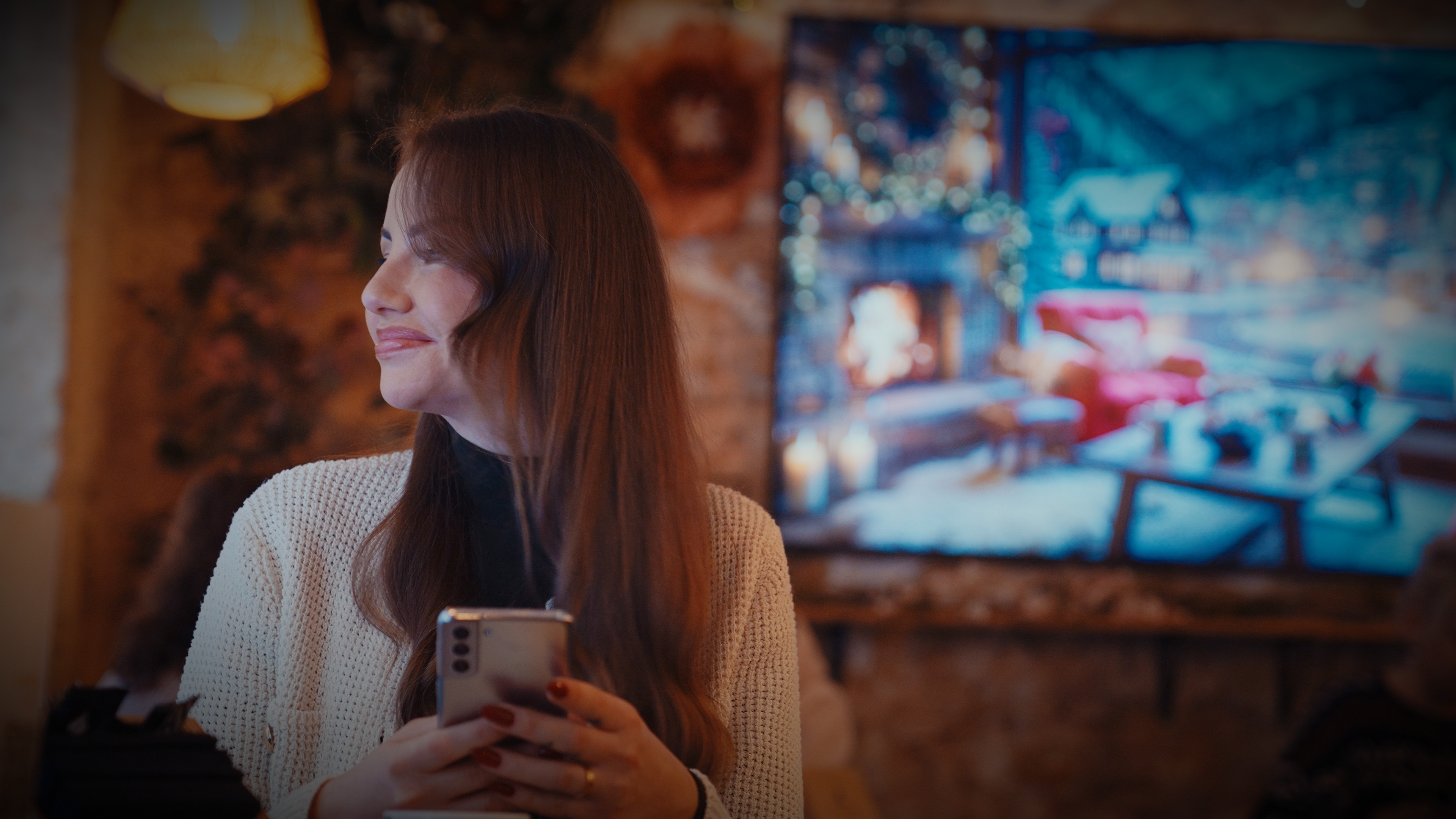 A woman with a head made of mirrors, reflecting light and creating a kaleidoscopic effect around her.