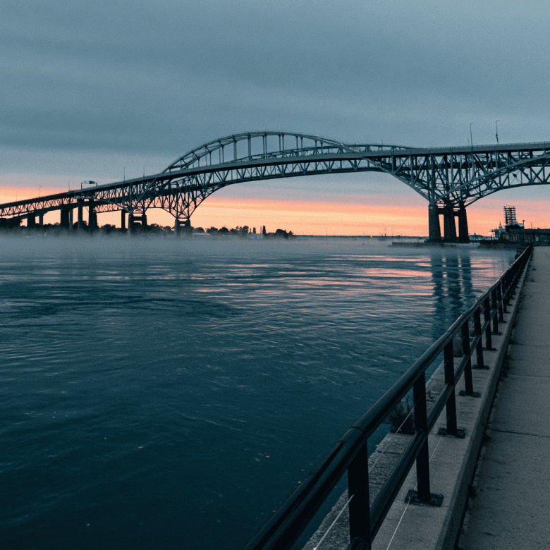 Lake Huron at sunrise from Port Huron waterfront with Bluewater Bridge