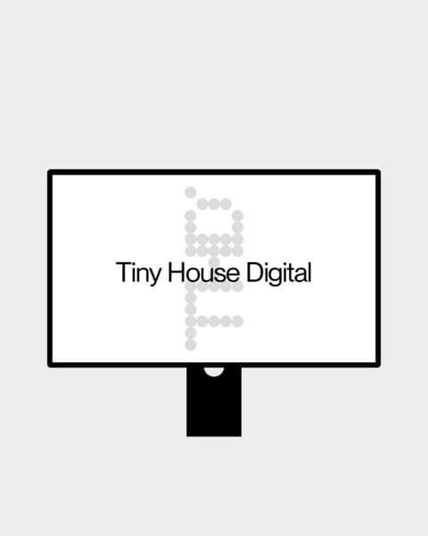 Screen mockup with a Tiny House Digital design.