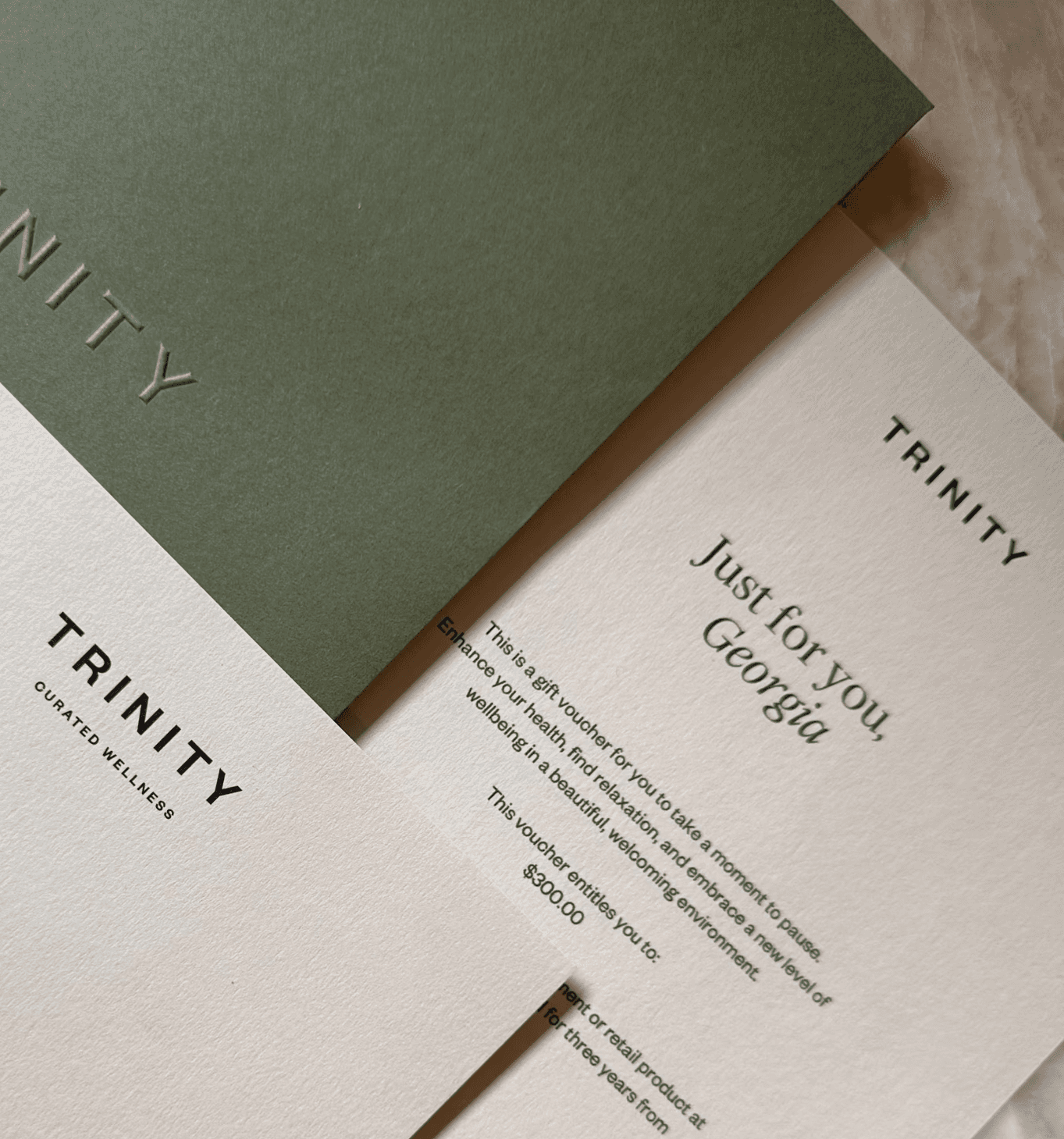 A woman practicing yoga in a spacious studio, positioned on a mat.