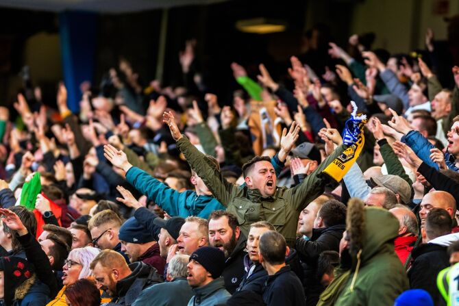 Watch a football match