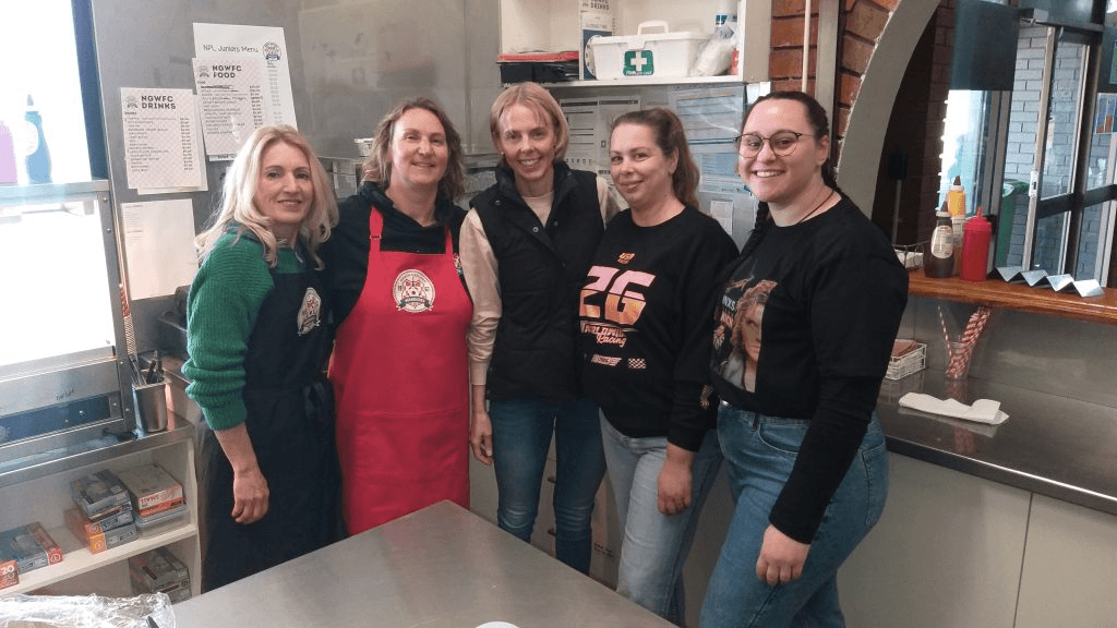 Club volunteers assisting at the North Geelong Warriors canteen on matchday.