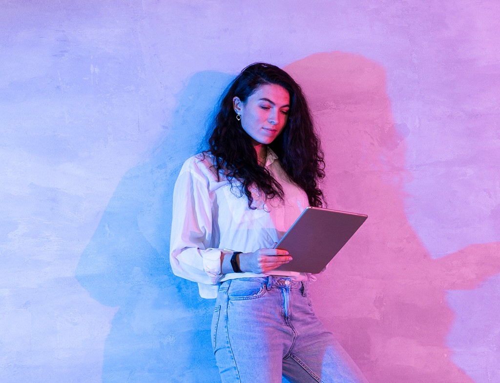 Professional reviewing data on tablet representing AI-first venture capital technology