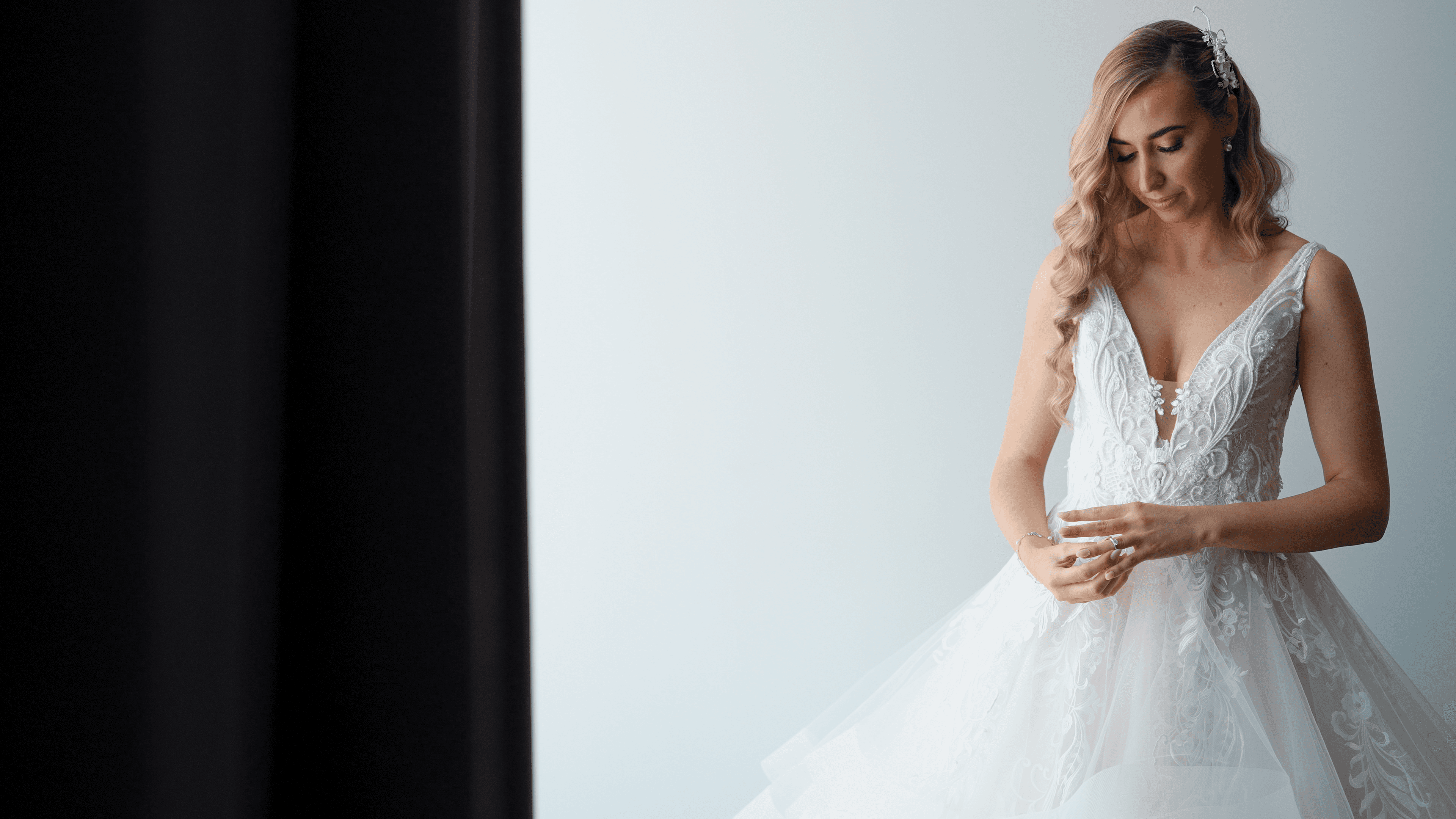 Bride sliding on her engagement ring while getting ready to get married at Bundaleer Rainforest Gardens Creo Bella Wedding Films
