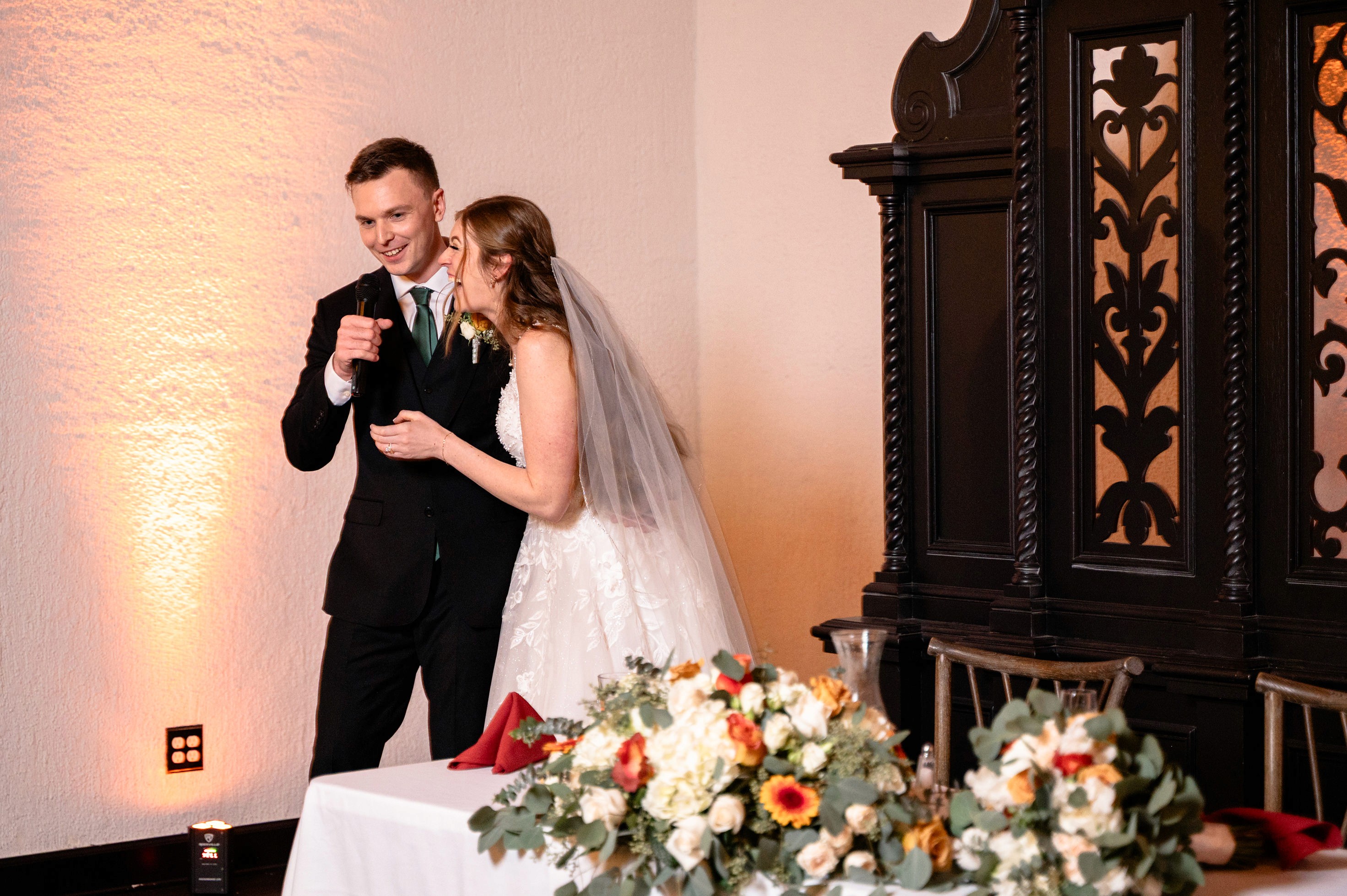 Flat lay wedding details with bouquet, rings, and sparkling bridal heels