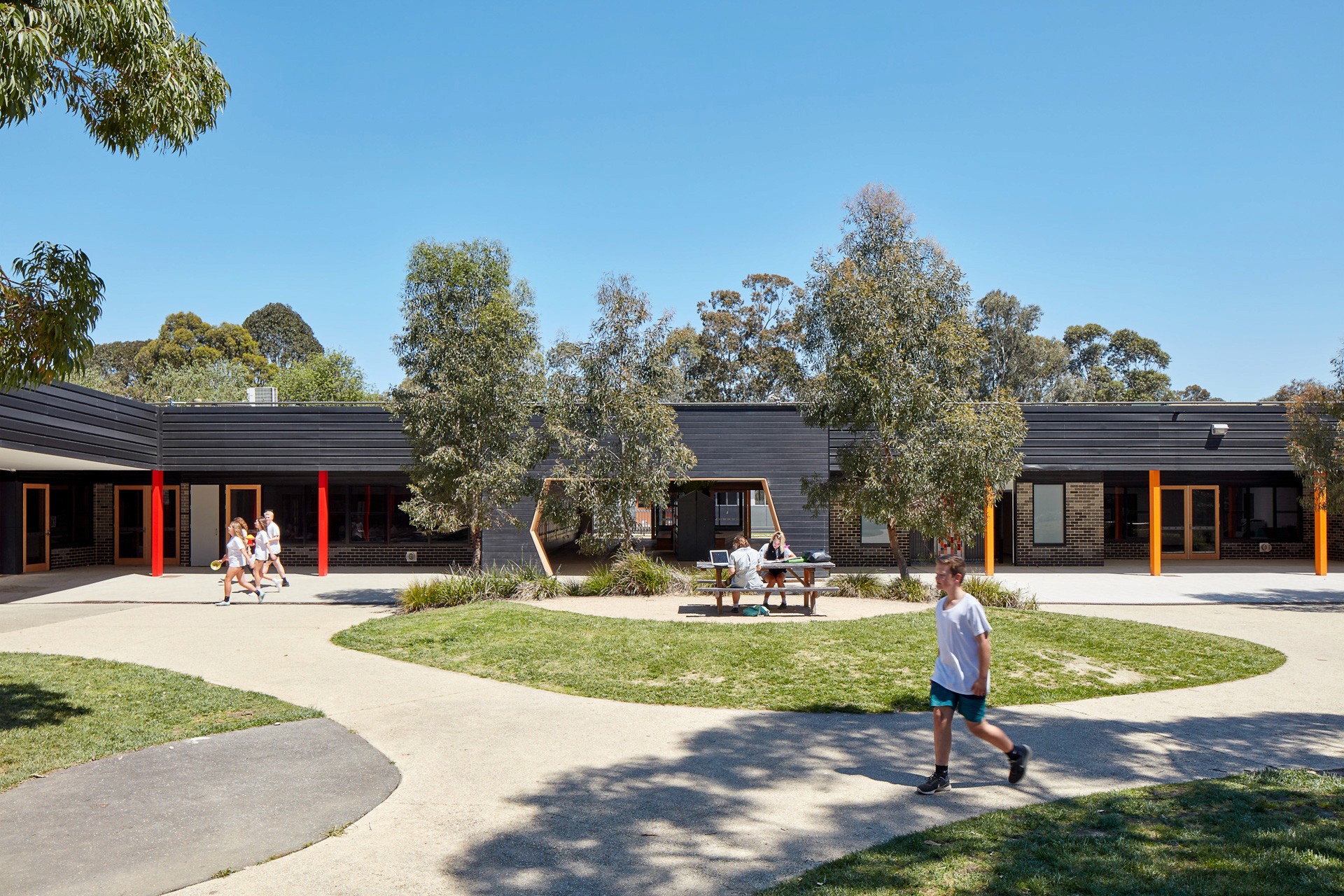 Geometric wooden wall panels with angled shapes and warm highlights.