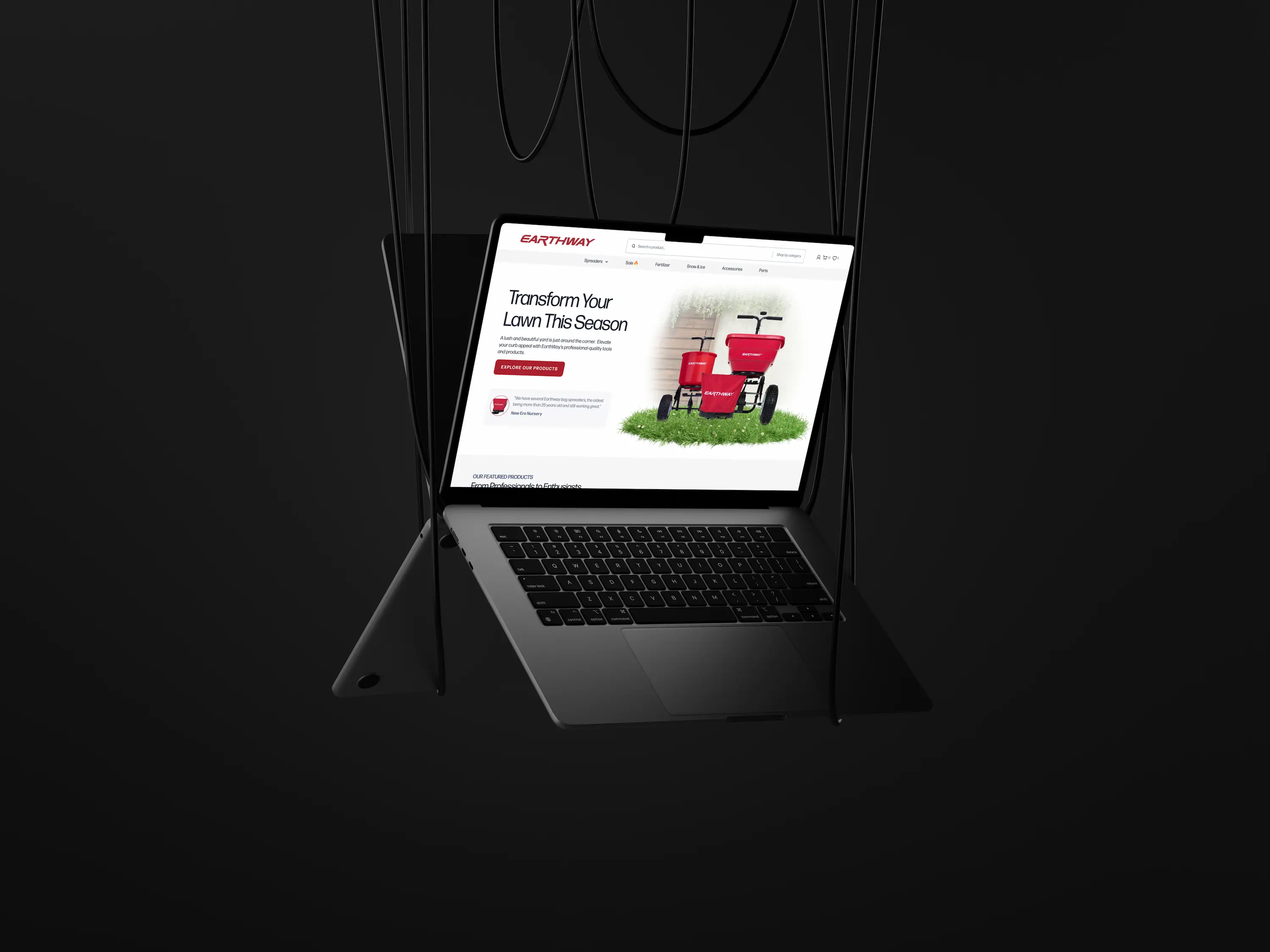 A laptop on a dark background displaying a colorful presentation or webpage.