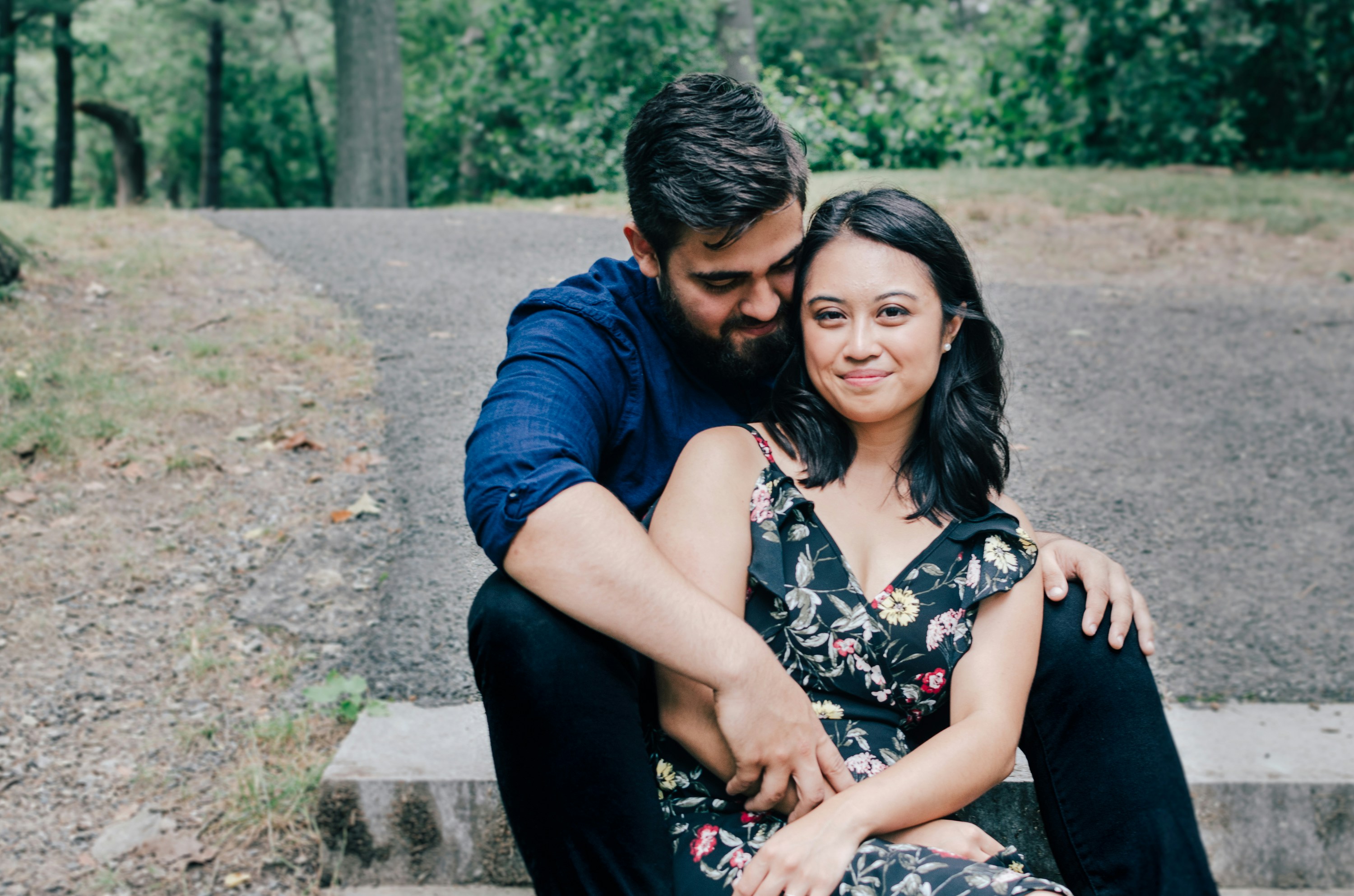 couple enjoying in park - Fall Couple Outfits