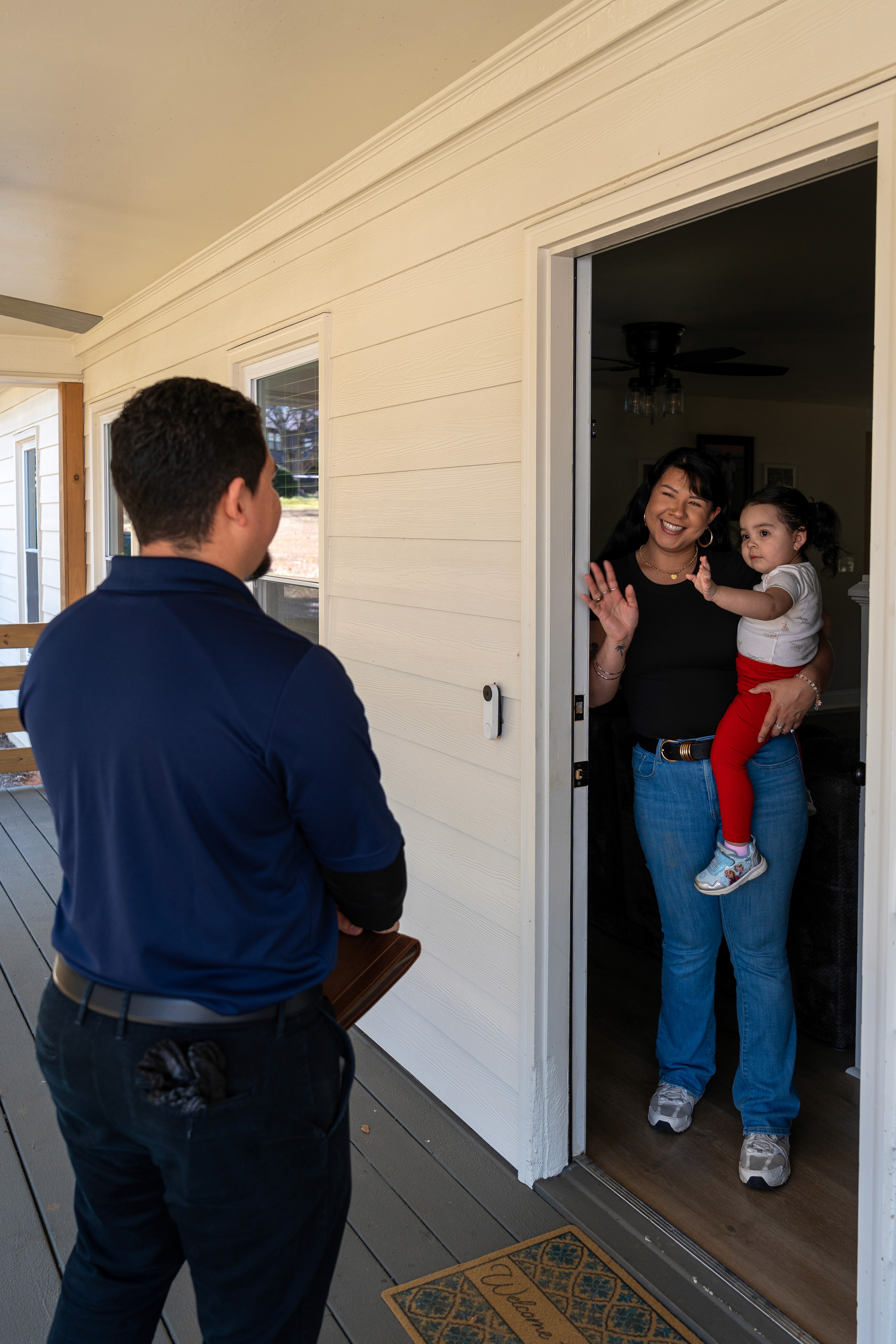 people sitting on chairs in front of table