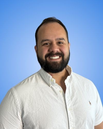 man in white crew neck shirt wearing black framed eyeglasses