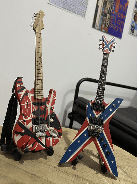 grayscale photo of woman wearing black spaghetti strap top