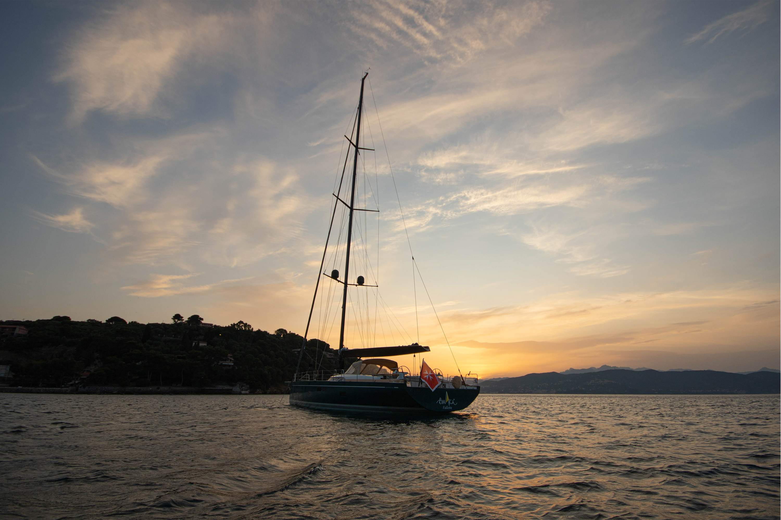 Bianca sailboat at sunset