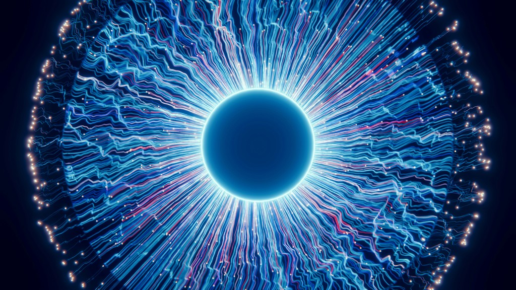 A close up of a blue eyeball in the dark