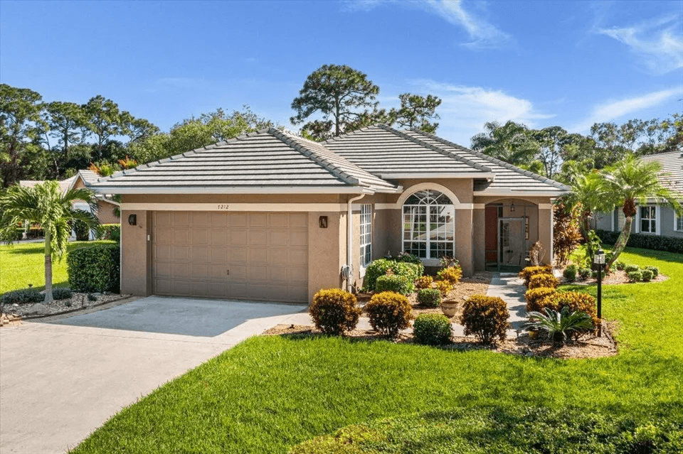 1995 New Roof Construction in Marsh Landing, PGA Village, Port St Lucie with Entegra Flat Broomswept Tile in Natural Gray