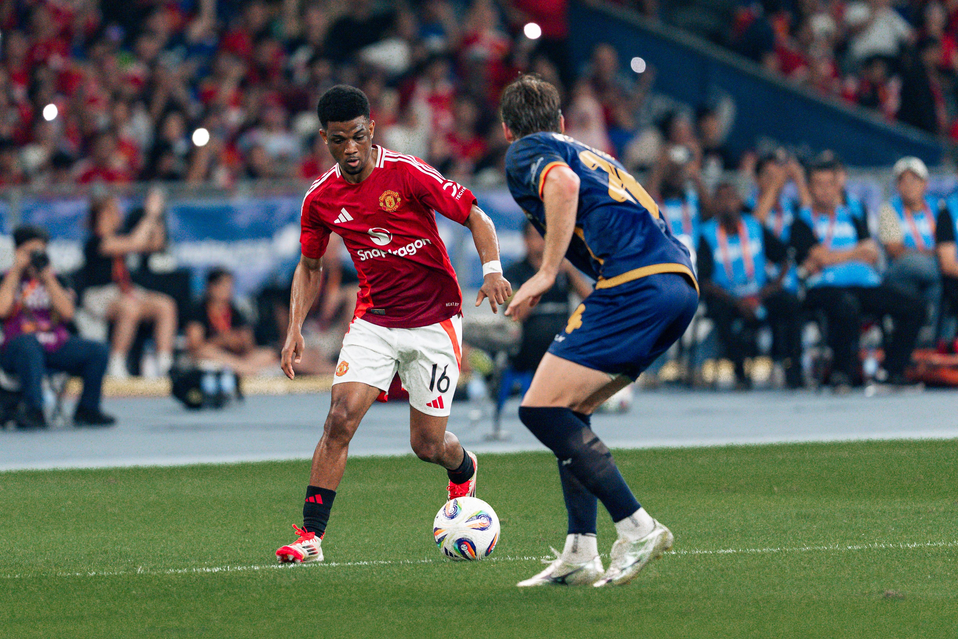Amad Diallo in action at the Maybank Challenge Cup 2025 match between Manchester United and the ASEAN All Stars